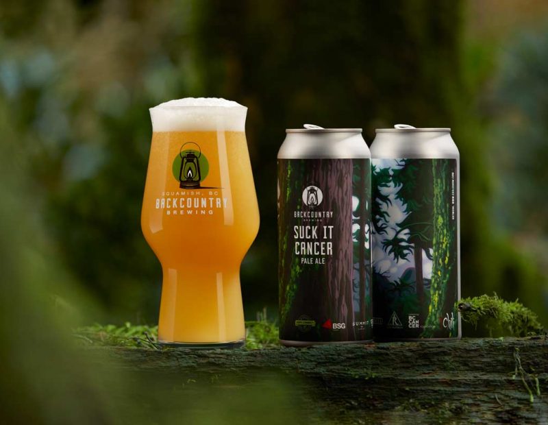 Backcountry Brewing | Cans of "Suck It Cancer" 2020 Release in a woodland setting - photo by Jordan Megahy